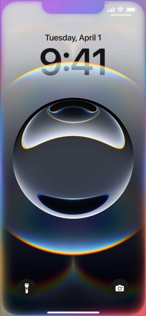 Hand holding iPhone 16e with colorful glowing edges around the Lock Screen.