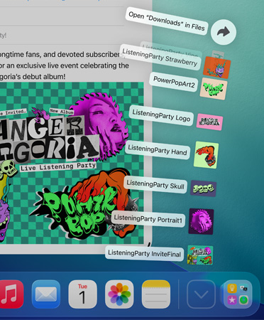 Tampilan jarak dekat Dock di bagian bawah dengan serangkaian file yang membuka dalam bentuk kipas secara vertikal dari Dock